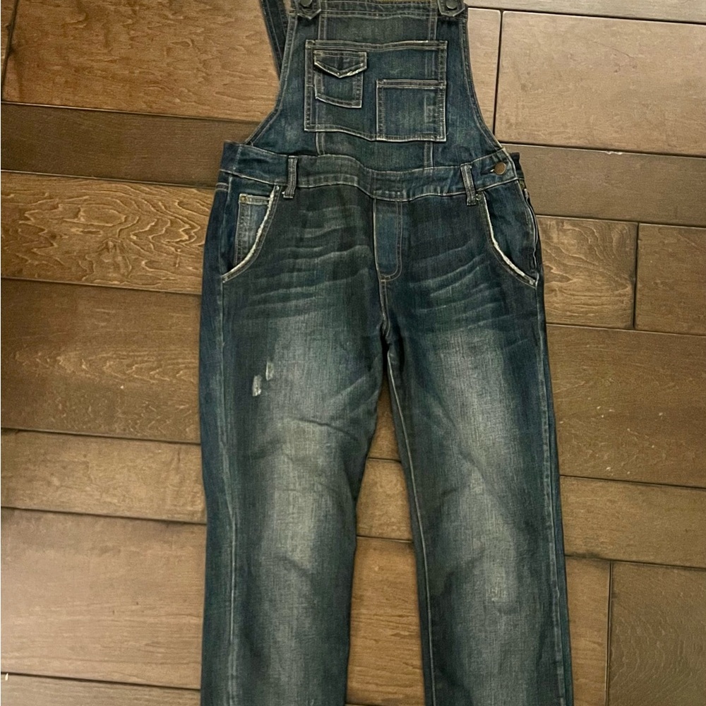 Free People Blue Denim Overalls with Adjustable Straps and Distressed Look